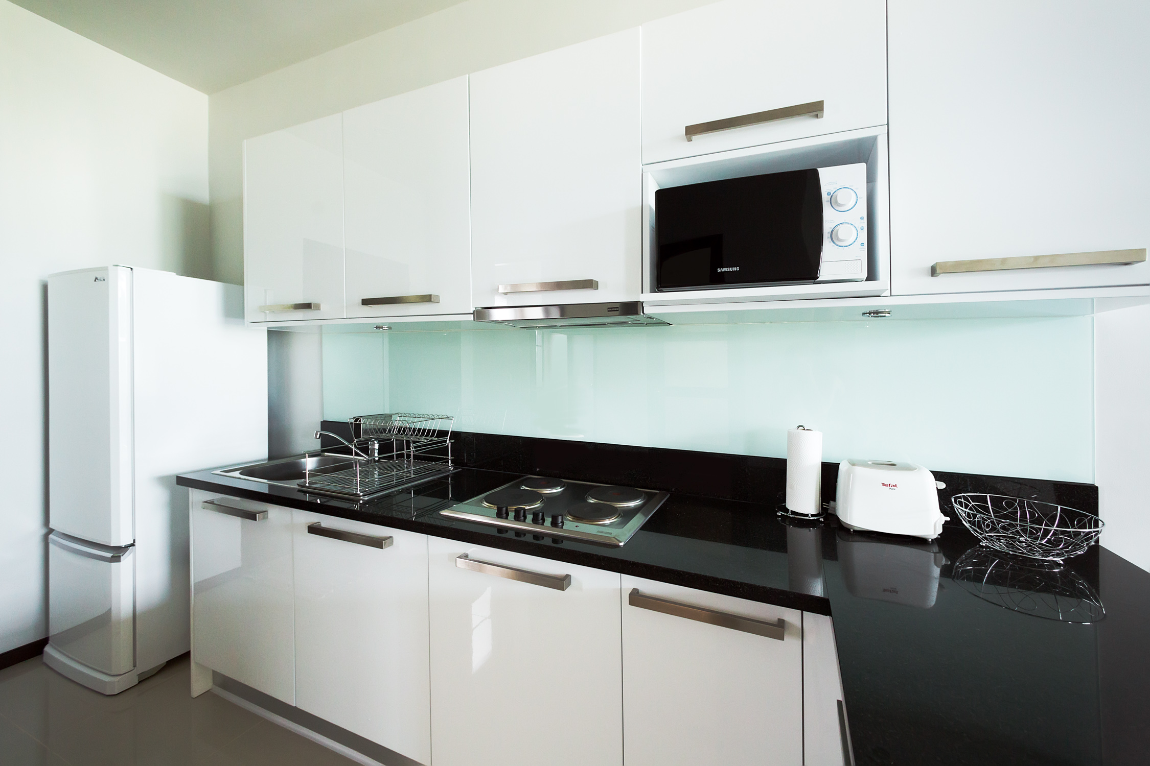 2 bedroom villa with a terrace and a pool in Nai Harn