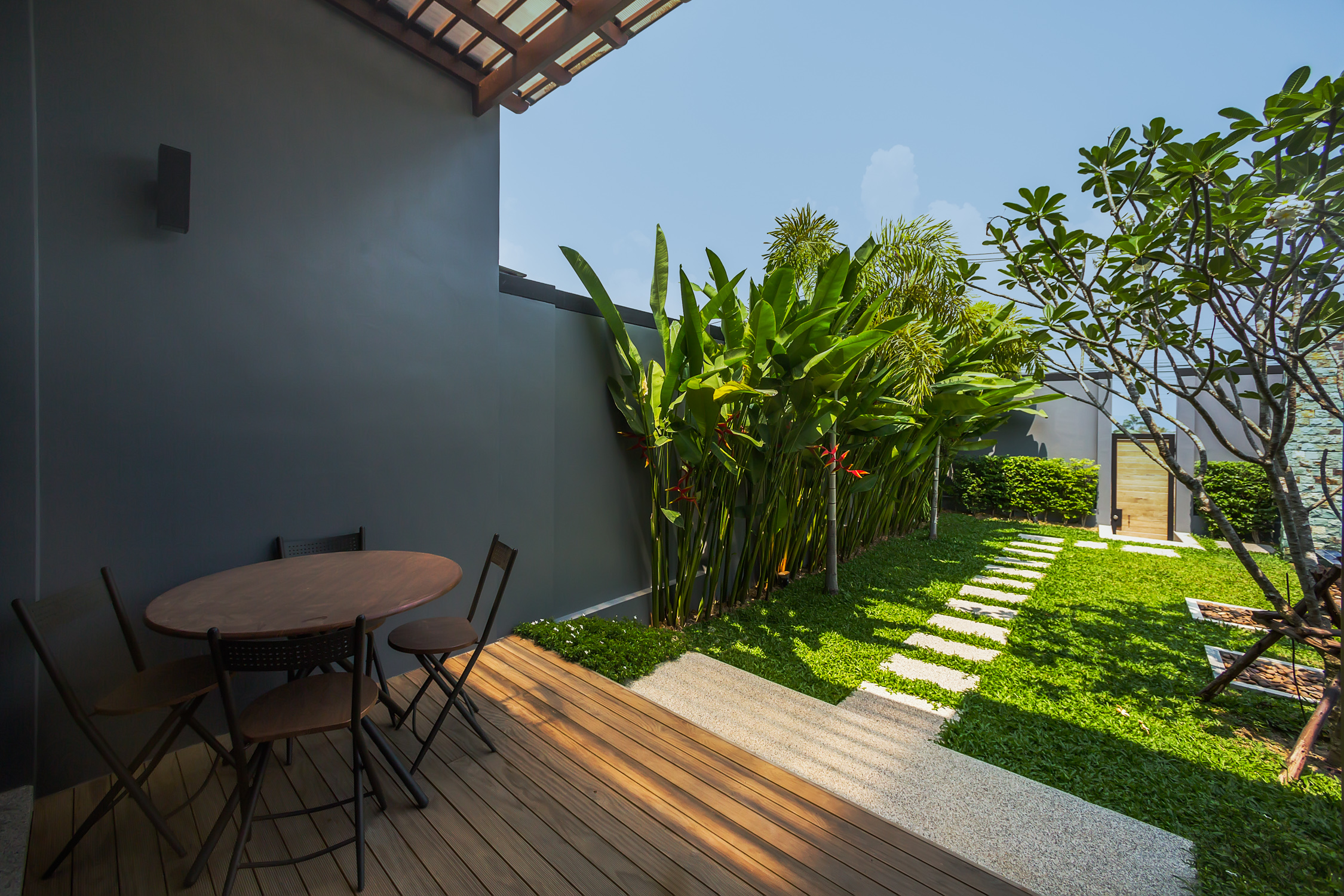 2 bedroom villa with a terrace and a pool in Nai Harn