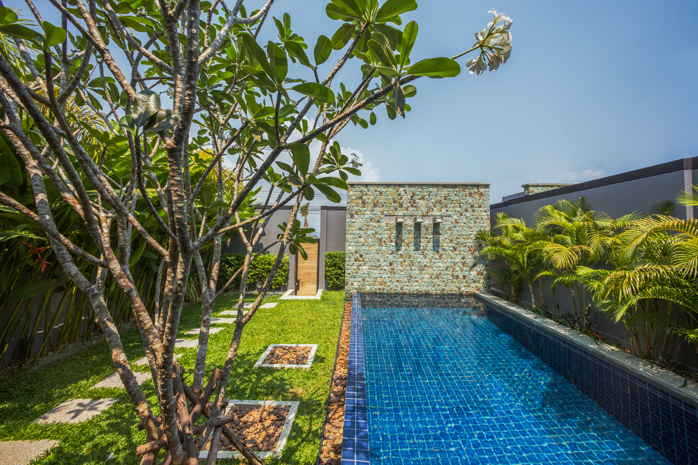 2 bedroom villa with a terrace and a pool in Nai Harn