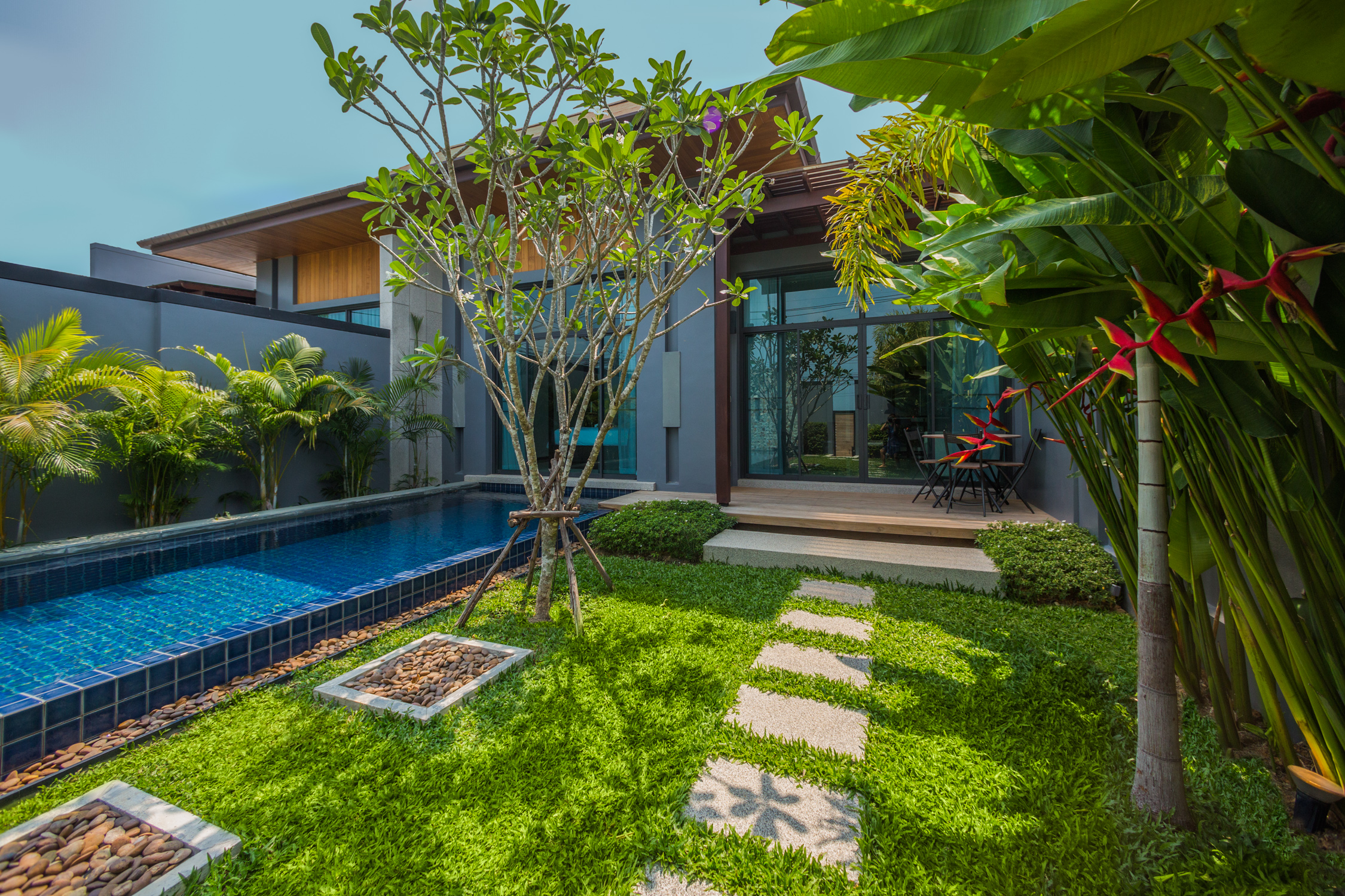 2 bedroom villa with a terrace and a pool in Nai Harn