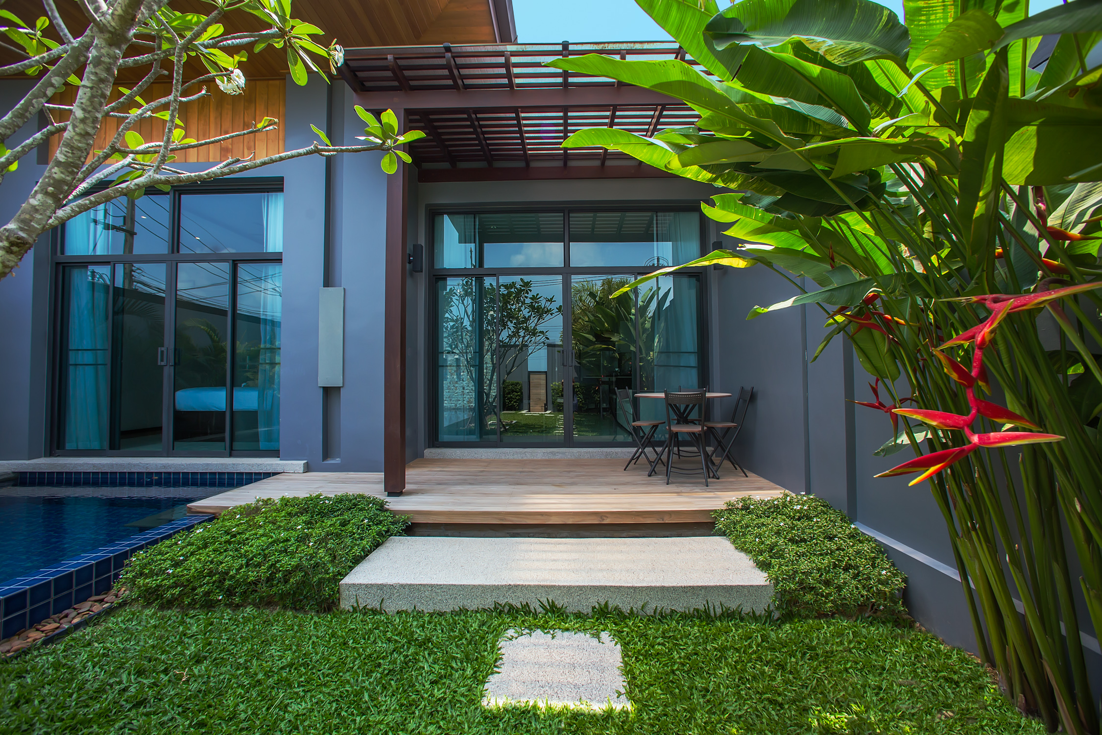 2 bedroom villa with a terrace and a pool in Nai Harn