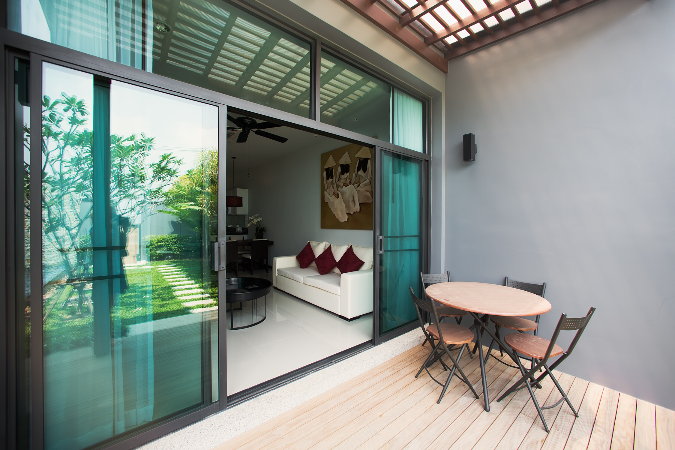 2 bedroom villa with a terrace and a pool in Nai Harn