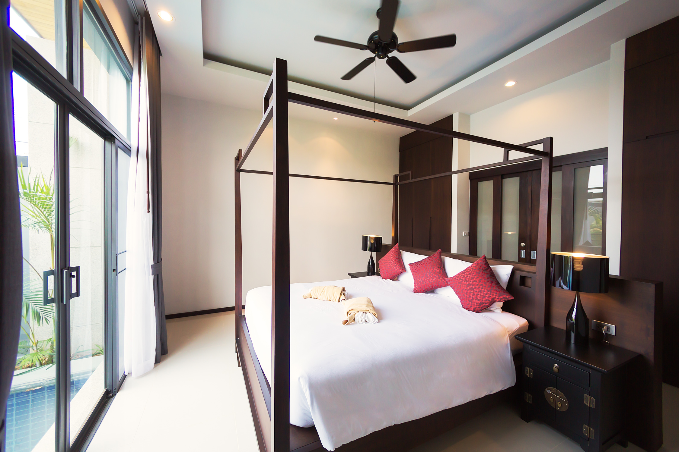 2 bedroom villa with a terrace and a pool in Nai Harn
