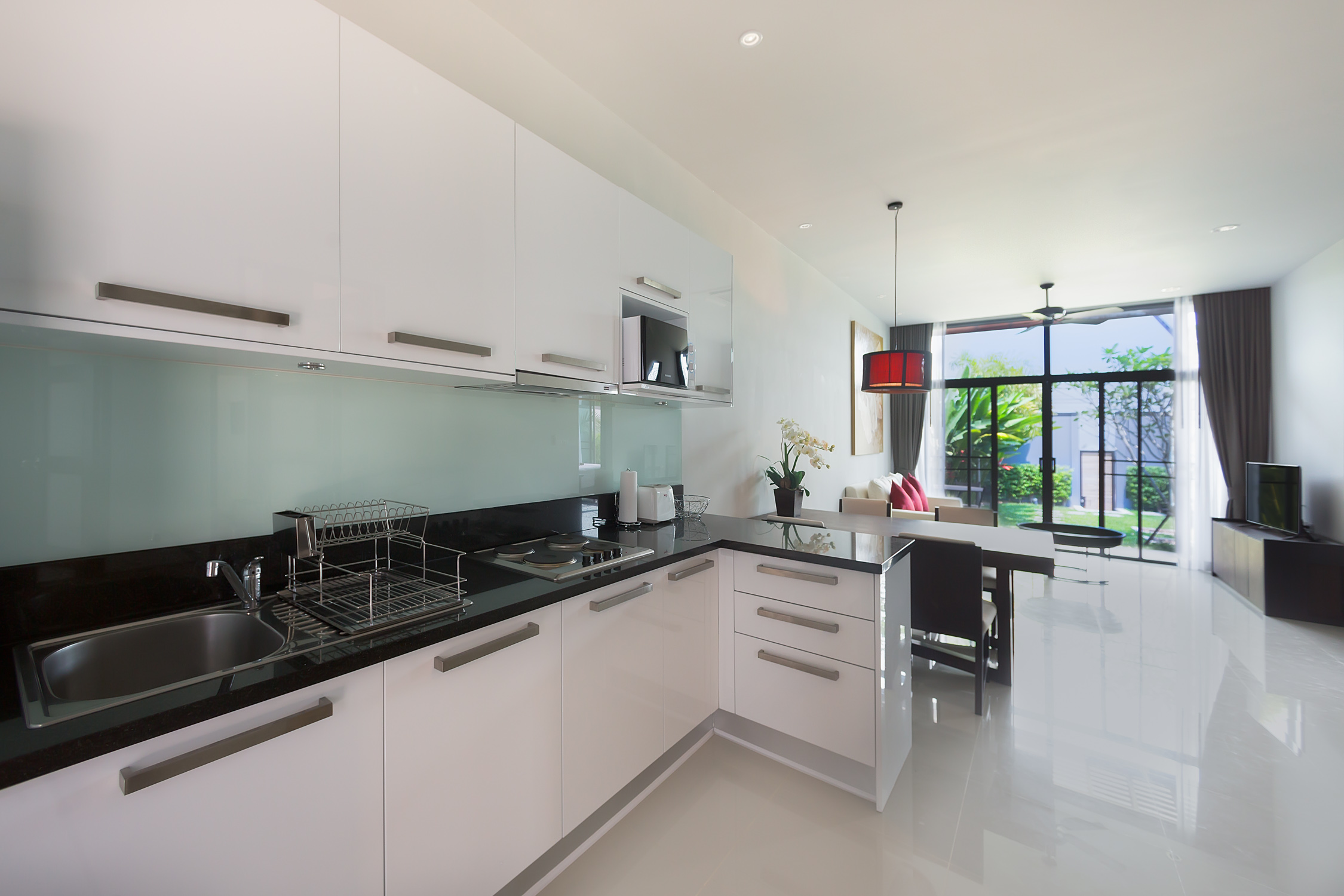 2 bedroom villa with a terrace and a pool in Nai Harn