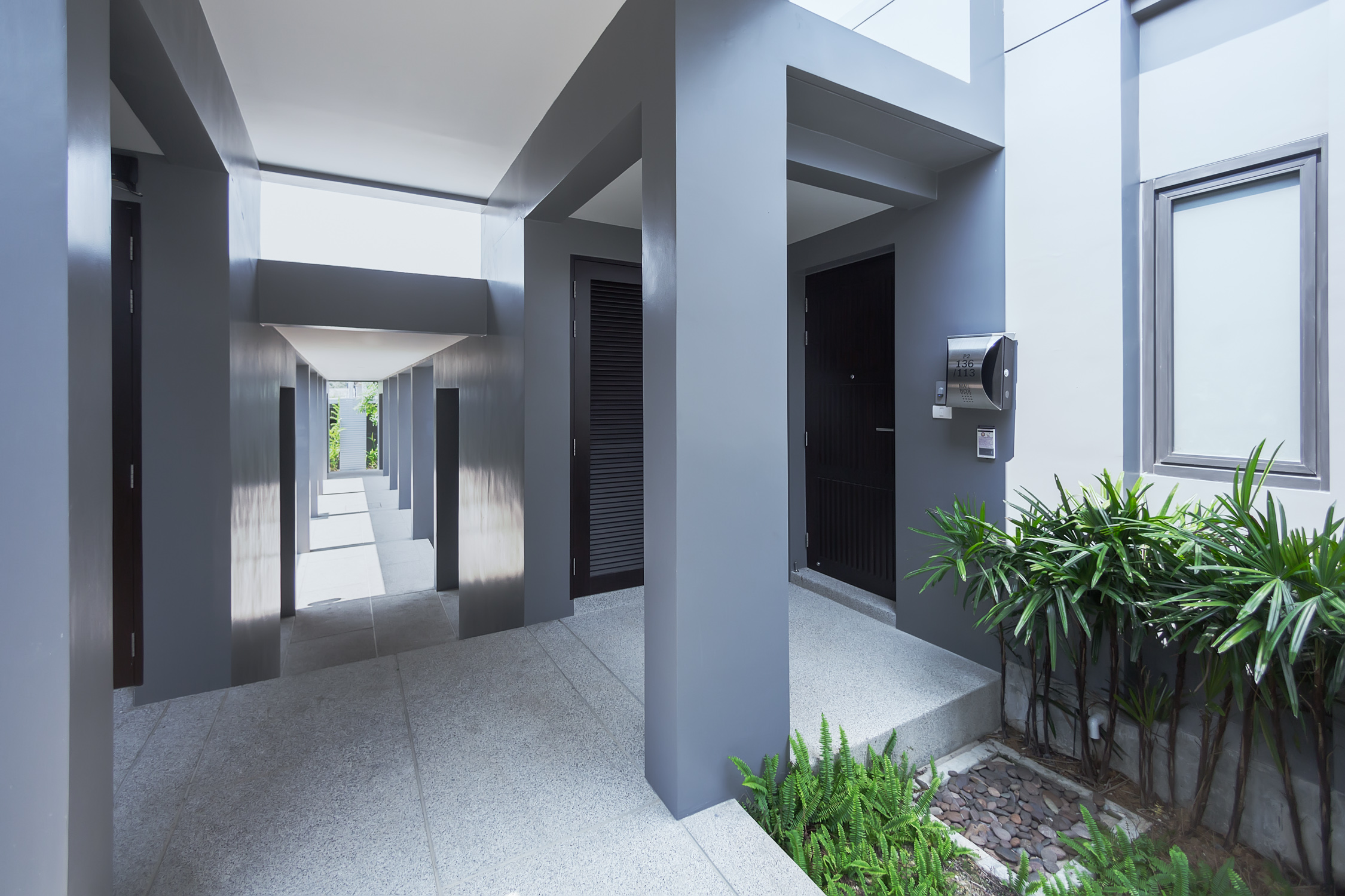 2 bedroom villa with a terrace and a pool in Nai Harn