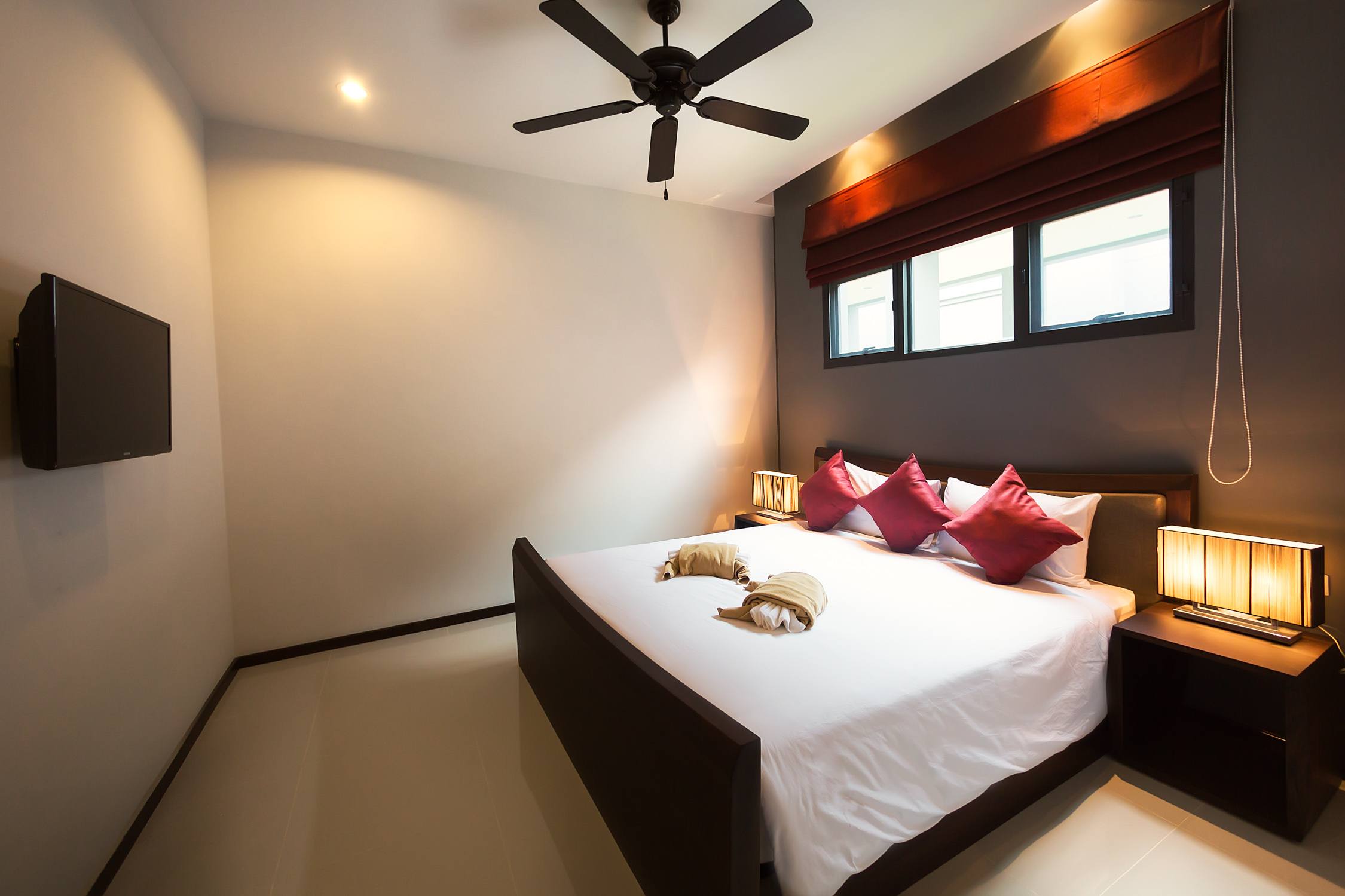 2 bedroom villa with a terrace and a pool in Nai Harn