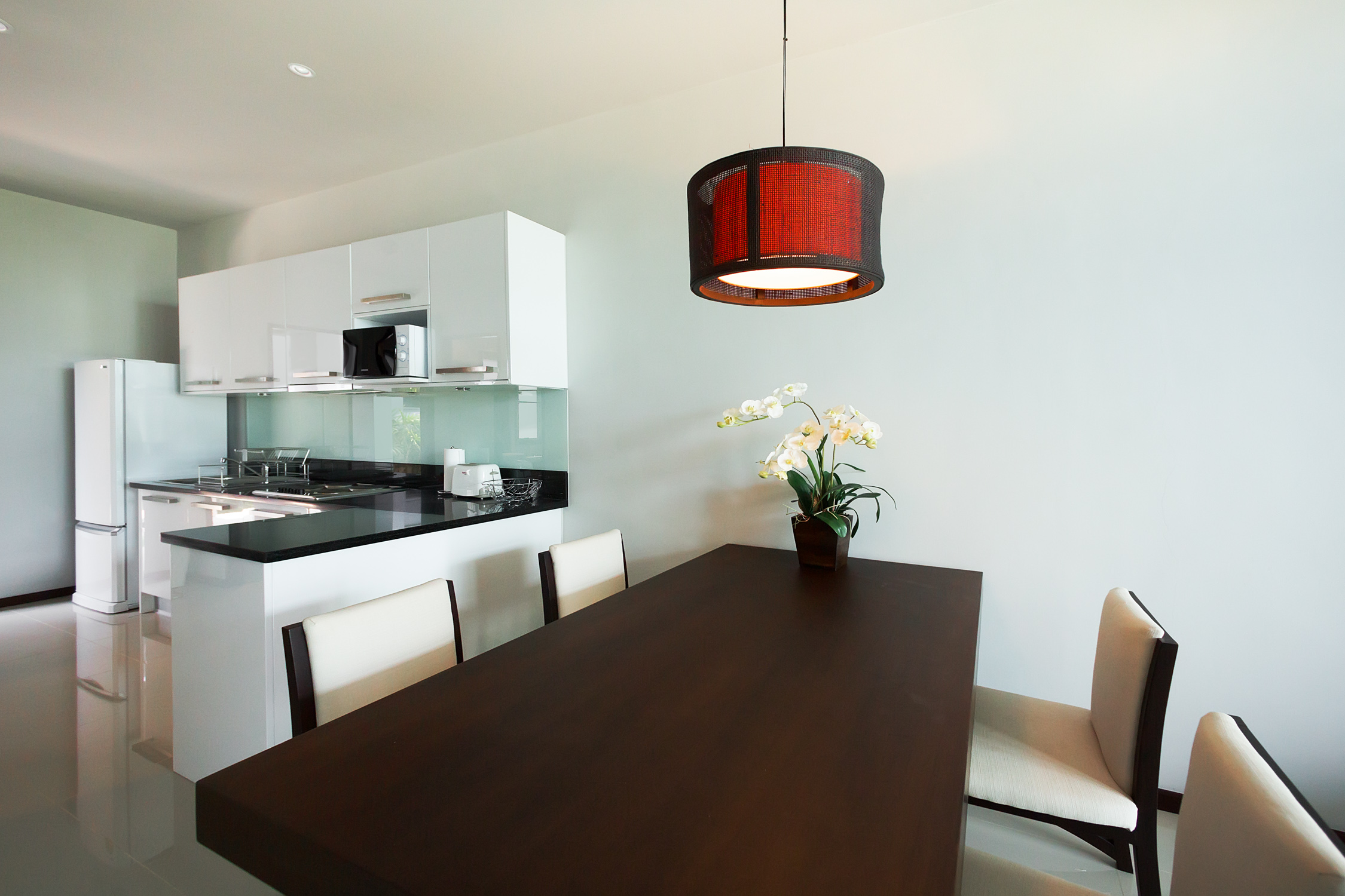2 bedroom villa with a terrace and a pool in Nai Harn