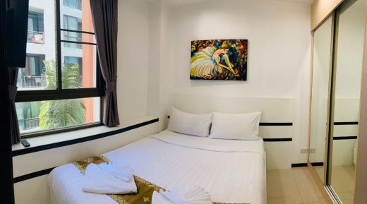 Cozy and spacious two bedroom apartment with access to the pool in Nai Harn